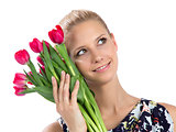 woman holding a bunch of red tulips bouquet of flowers s