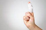 Injured finger with bandage