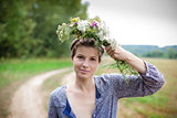 young woman with wild flowers