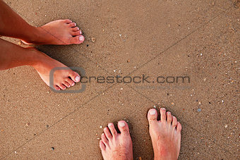 footprints in love couple in the sand on the seashore