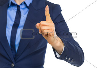 Closeup on business woman showing finger
