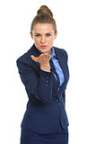 Portrait of happy business woman blowing kiss