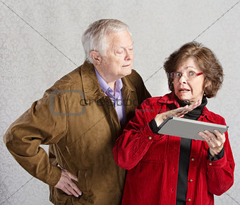Nosey Man and Lady with Tablet