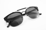 Unisex black modern sunglasses isolated on white background