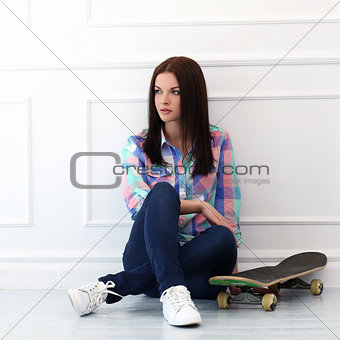 Beautiful girl with skateboard