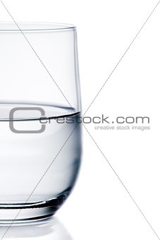 half glass of pure water with space for text