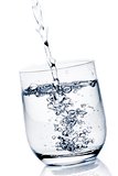 filling a glass with pure water