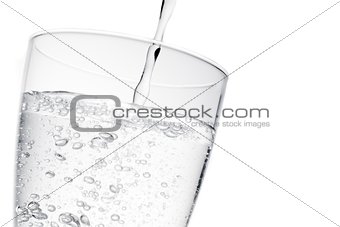 filling a glass with pure water with bubbles and space for text