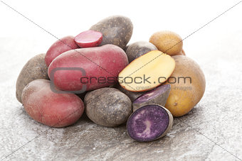 Red, purple and yellow potatoes.