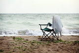 folding chair on shore
