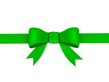 green ribbon with bow, isolated on white