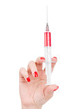 Syringe in hand on a white
