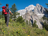 Hiker admiring mountain landscape