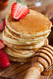 Pancakes with strawberry and honey