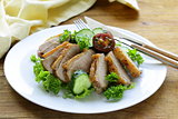 salad with grilled duck fillet, tomato and green lettuce