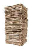 Towering stack of newspapers for recycling