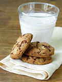 delicious homemade cookies with chocolate chips on a wooden table