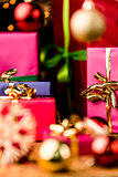 Magenta and Blue Gifts amidst Golden Glitter