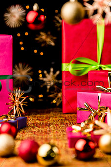 Xmas Background with Gifts, Stars and Spheres