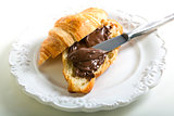 Croissant with chocolate paste.