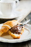 Croissant with chocolate for breakfast. 