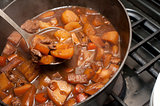 Delicious beef stew cooking in a pot