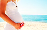 pregnant woman on the beach 