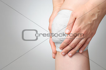 Injured knee with bandage