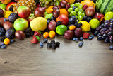 Big assortment of Fresh Organic Fruits, frame composition on woo