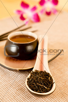 Tea leaves on a tea spoon