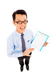 smiling businessman hold a record document