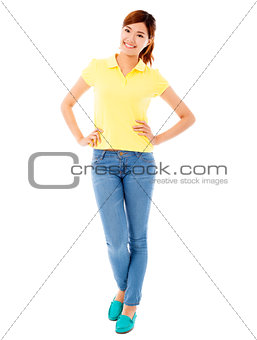 Beautiful young woman standing with white background