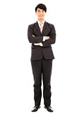 young businessman standing isolated on white background