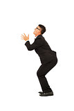 young business man standing a funny pose with white background