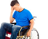 upset handicapped man sitting on a wheelchair