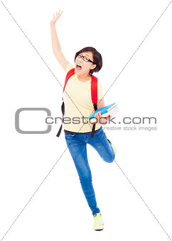 happy young student girl running and raising a hand
