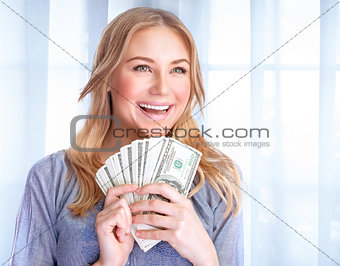 Happy woman with lot of money