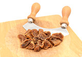 Chopped soft dried figs with a rocking knife