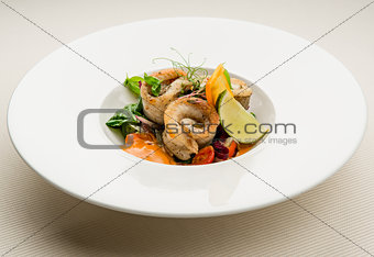 Roasted fish fillet with vegetables