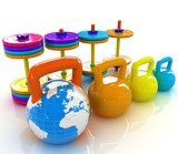 Colorful weights and dumbbells and earth. Global 