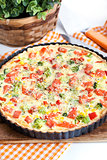 Quiche with salmon and vegetables