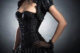 Close-up shot of an elegant woman in Victorian style corset 