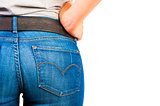 ass in jeans closeup on white background