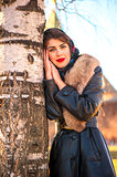 Beautiful Russian girl near birch