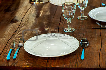 textured wooden worktop and table utensils