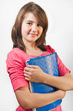 Portrait of smiling teen girl holding books, isolated on white background