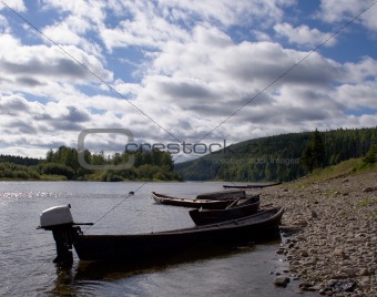 Boat on coast of the river 