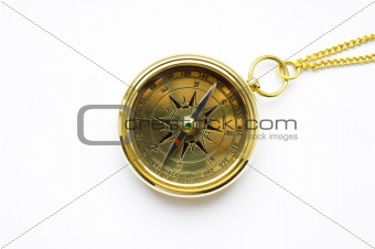Old style gold compass with chain on white background