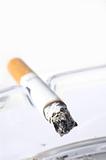 Cigarette in ash tray
