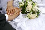 just married - hands, rings, bouquet